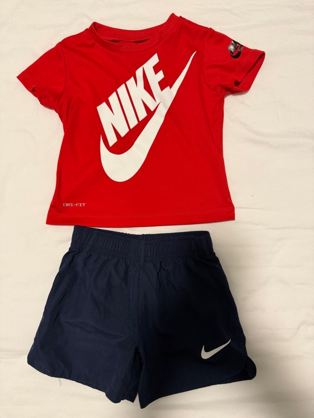 Nike Red Tee with Navy Athletic Shorts